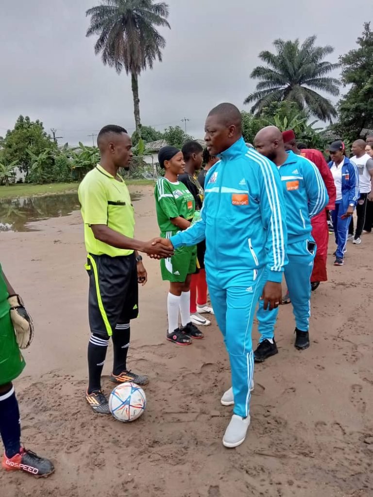 Littoral Regional Delegate of MINJEC leading LOYOC officials in greeting players before start of opening match